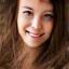 Emma Lee smiling, headshot
